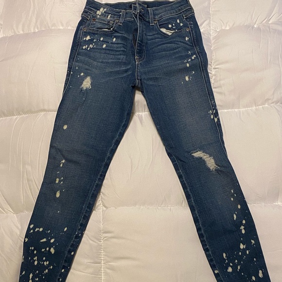 Level 99 paint splattered skinny jeans in size 26